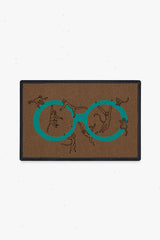 Monkey See Monkey Do Turquoise Doormat by Iris Apfel